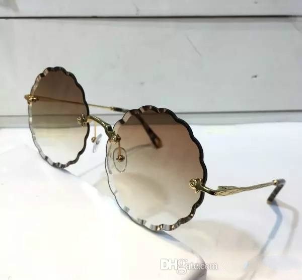 Luxury 142 Occhiali da sole per donna Fashion Deisng CE142 Round Frameless UV400 Len Summer Style Adumbral Butterfly Designer Face Vieni con custodia