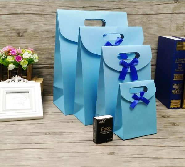 

sky blue color 70pcs/ lot small gift fashionable packaging advertising paper bag with bow tie