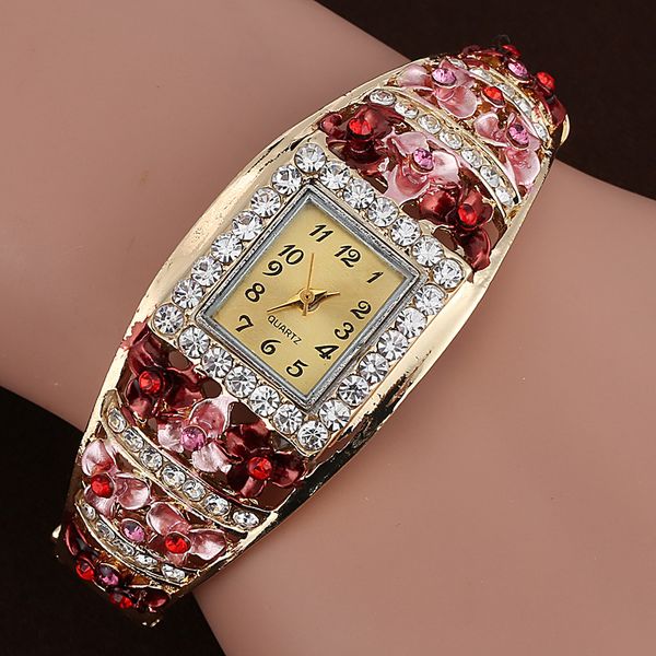 

mance new fashion women quartz crystal flower bracelet, Slivery;brown