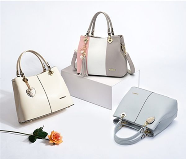 

spring 2018 new women's bags commuter bucket bag fashion joker bag slanting straddle bag large capacity handbag