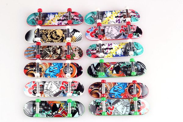 

Novelty Creative Mini Finger Skateboards Color Random New Design Finger Skateboard FingerBoard Kids Children Gift Toys TO488