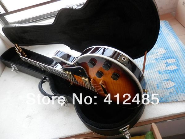 

New g cu tom electric guitar honey bur t mu ical in trument ebony fingerboard foam box packaging with hardca e