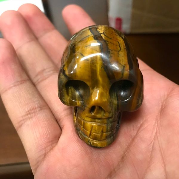 

the tiger's eye stone skull and set is a collection of natural crystal stone british antiques carved by chinese maste, Black