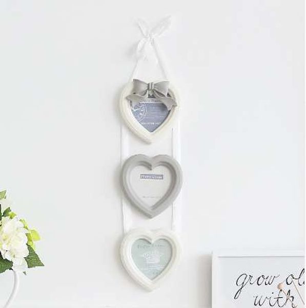 Bow Europeia geral Photo Frames parede Heart-shaped 4 polegadas 3 polegadas Pictures Quadro Combinação Wall-montado Foto Decoração Quadro 14X63CM