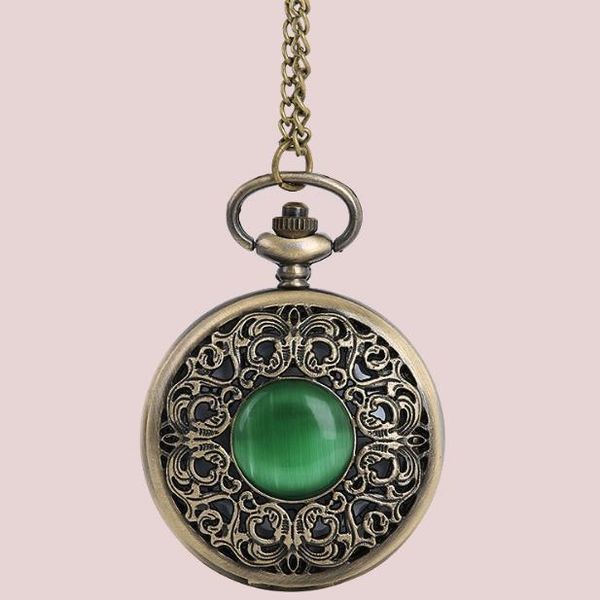 

large bronze vintage pocket watch creative center a bit of emerald cat eye carved hollow pocket watch 8063, Slivery;golden