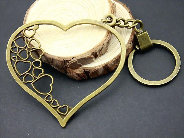 

6 pieces key chain women key rings for car keychains with charms hollow hearts 70x68mm, Slivery;golden