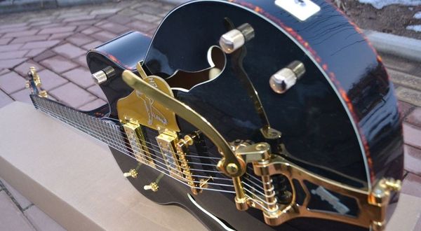

rare black falcon g6120 semi hollow body jazz electric guitar turtle shell body binding, double f holes, big tremolo bridge, korean tuners