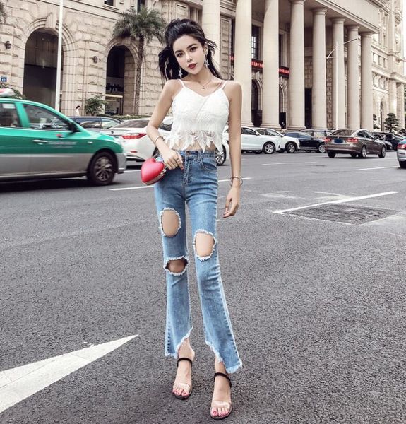 

women's wear is perfect with holes, frayed edges and irregular jeans, Blue