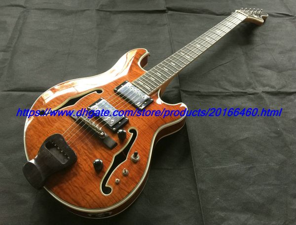 

electric guitar hollow body orange color ebony fingerboard ebony tail chrome parts