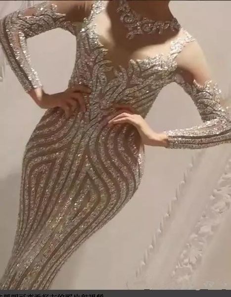 Yousef Aljasmi 2020 Luxury Long Sleeve Wippleine Mermaid Comunom Dresses Sexy Gioiello Sheer Neck Wear Beads Celebrity Prom Gowns249W