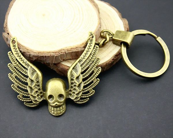 

6 pieces key chain women key rings fashion keychains for men wing skull 51x46mm, Slivery;golden