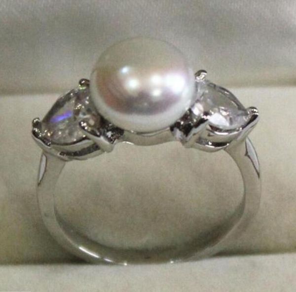 

ll<<< lady's ring with crystal decorated & 9-10mm white shell pearl ring, Silver