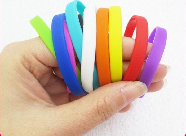 

100pcs mixed cartoon children rubber hand bands silicone bracelets with sm563, Golden;silver