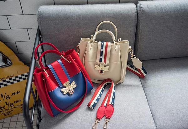 

2018. new pattern. casual fashion woman bag. a bucket bag. handbag. small. pu. cross body. shoulder bags. totes. designer handbags