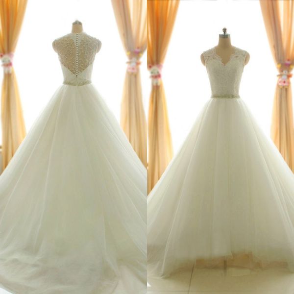 

2019 stunning a-line wedding dresses v neck sleeveless lace appliques illusion back exquisite beading crytals pearls tulle bridal gown, White