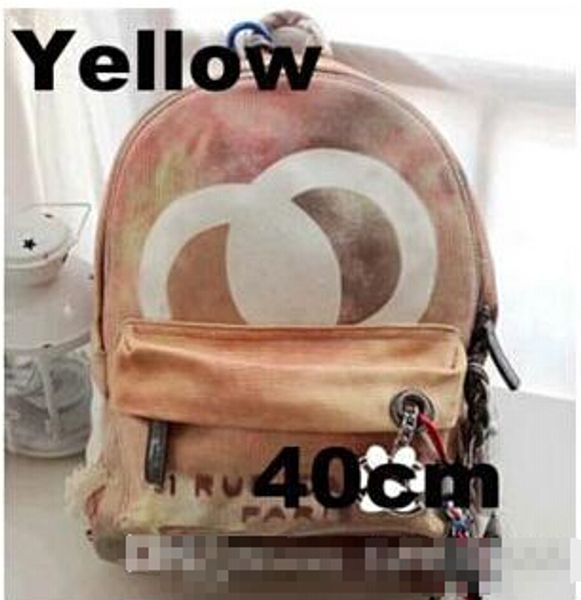 

graffiti printed canvas backpack rope bag embroidered with multicolored print canvas backpack school bag