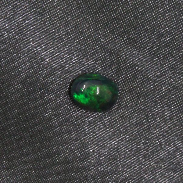 

7mm*9mm oval black opal loose gemstone