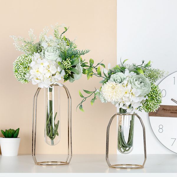 

hand holds large artificial flower plant bonsai wedding decoration ins wind