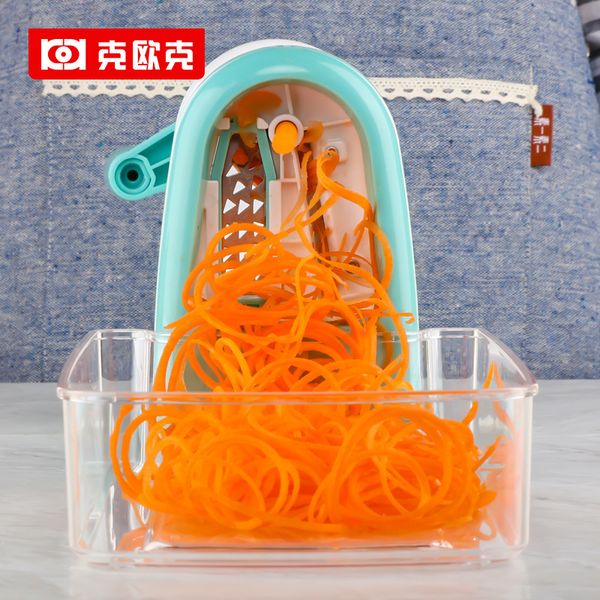 

a rotating hand spiral vegetable cutting machine vegetable cutting machine