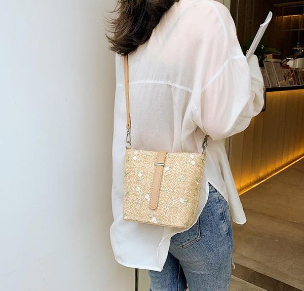 

the new lace embroidered beach woven bag dual-use retro wild casual straw bag