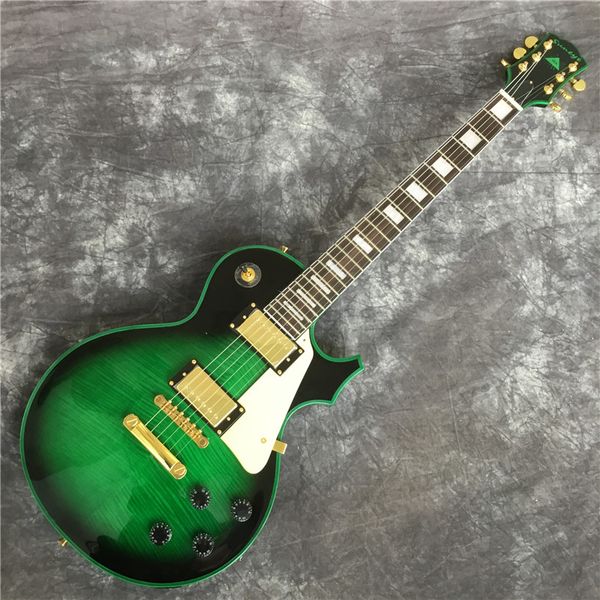 

2019 6 string electric guitar, mahogany body with flamed maple green paint,ing
