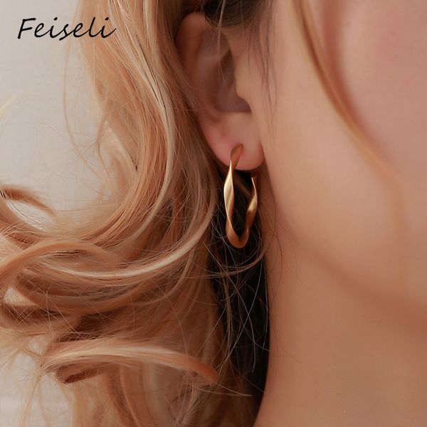 

feiseli classic silver gold color creative simple geometric twisted hoop earrings vintage personalized hollow matte earrings, Golden;silver