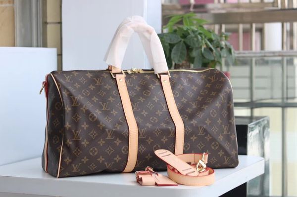 

60CM large capacity women travel bags famous classical design hot sale high quality men shoulder duffel bags carry on luggage keepall