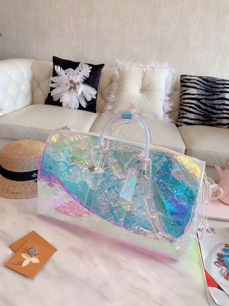 

2019 brand fa hion luxury de igner bag 19 pvc la er colorful pri m keepall 50 luggage men women de igner handbag pur e duffle bag