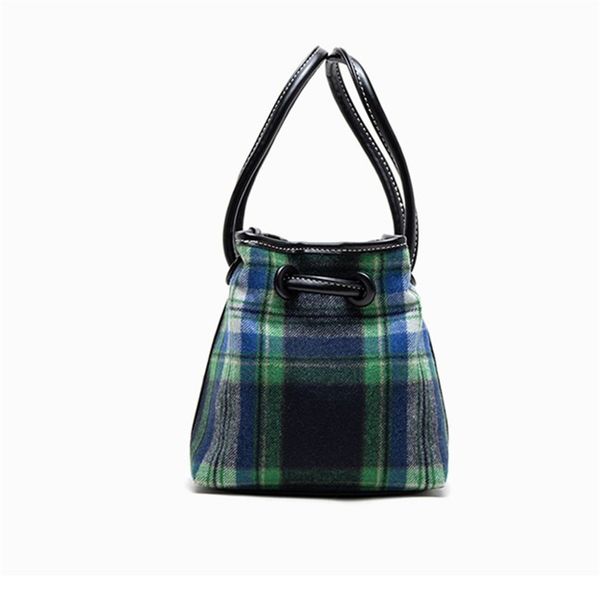 

designer handbag autumn and winter design cloth drawstring button bucket bags thousand bird pattern simple lamb hair bag shoulder bags 5