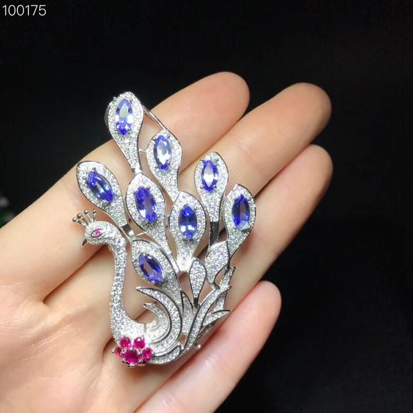 

natural tanzanite , blue gemstone, sterling silver, swan style, can be used as a brooch