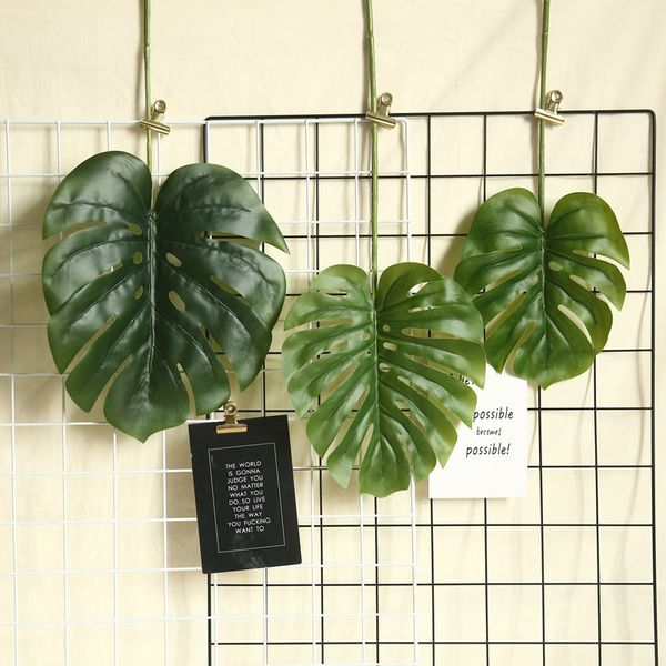 

большие искусственные зеленые растения листья главная украшения сада поддельные растения фотография фон монстера листья