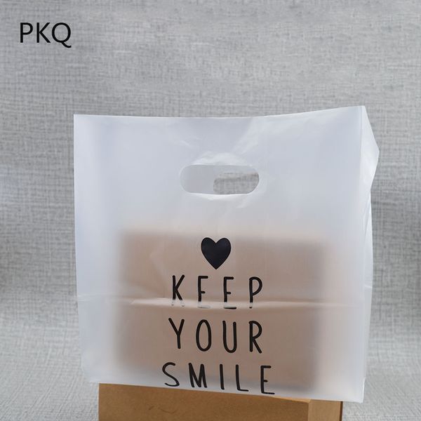 

50pcs translucent plastic packaging bag candy gift bag heart with smile party favor cookie cake plastic with handle