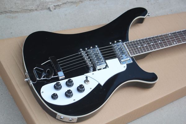 

black electric guitar with 6 strings,r tailpiece ,dots fret inlay,chrome hardware,white pickguard,5 knobs