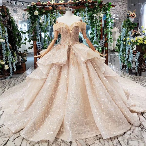 

2019 latest saudi arabia wedding dress tassel short sleeve backless lace up back ruffle sweetheart neck applique sequins bridal gowns garden, White