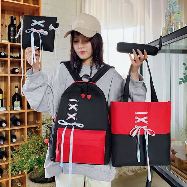 

2020 new backpack women's four-piece canvas junior high school student bag large capacity fresh backpack women's