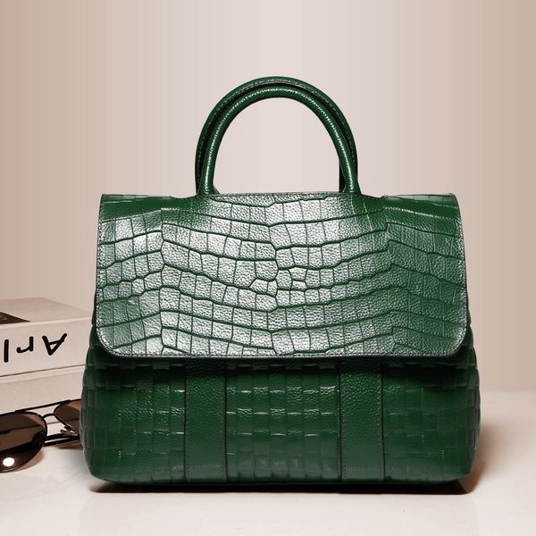 

2018 new stone print leather women's bag hand-held flip-shoulder slant bag