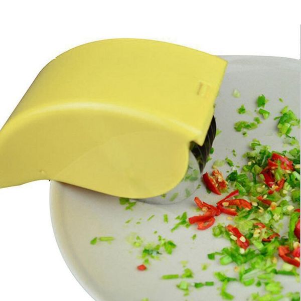 

stainless steel roller cut gadget vegetables kitchen onions chopped green pepper garlic press jan88