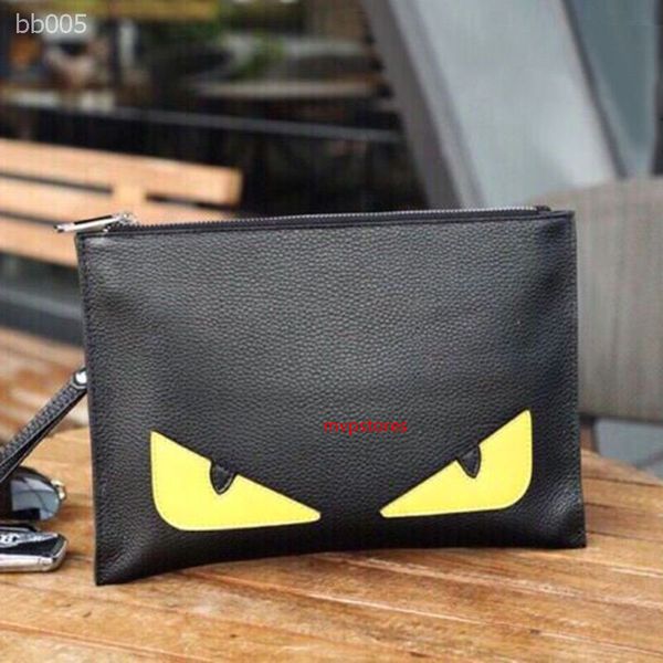 

2020 new small monster clutch bag small devil envelope bag tide young male leather clutch bag factory direct sale size 28x20x2cm