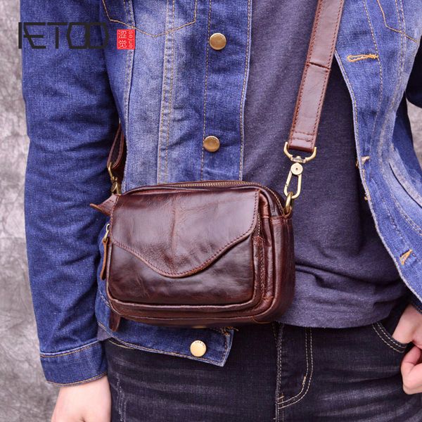 

aetoo retro oil wax leather men's messenger bag head layer leather cross section flip summer casual phone bag