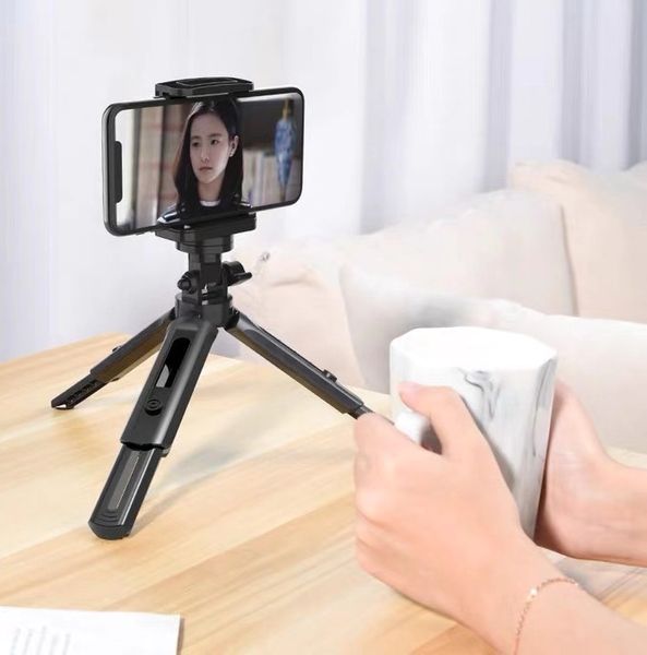 

deskphone tripod can be shrunk and stretched 360 degrees triangular bracket