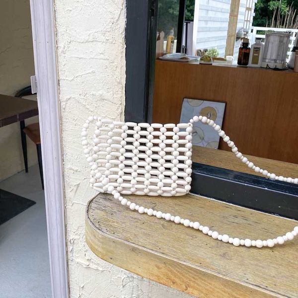 

2020 new european and american resin beaded bags knitting bamboo designer flap bag korean hollow out ladies crossbody phone bag