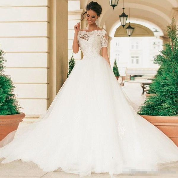 

sheer beaded lace wedding dresses with illusion short sleeve appliqued pearls bateau neck vintage covered buttons bridal gowns, White