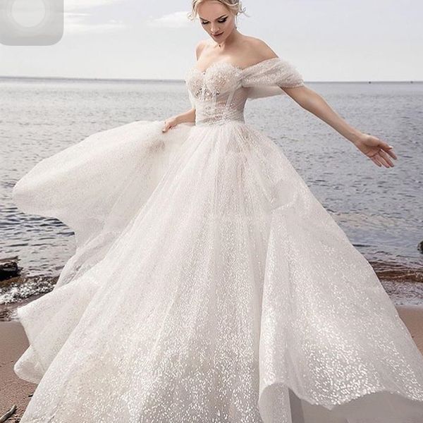 Glitzernde Brautkleider in A-Linie, Strandzeremonie, schulterfrei, bodenlang, böhmischer Boho-Stil, bezaubernde Bling-Pailletten-Brautkleider, Hochzeitskleid aus China