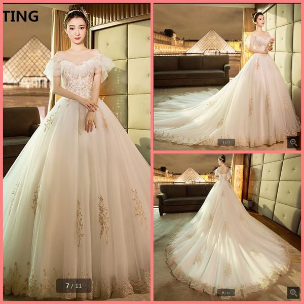 

2020 luxury white lace appliques ball gown wedding dress short sleeve beaded hollow back corset bride dress princess puffy selling 2020