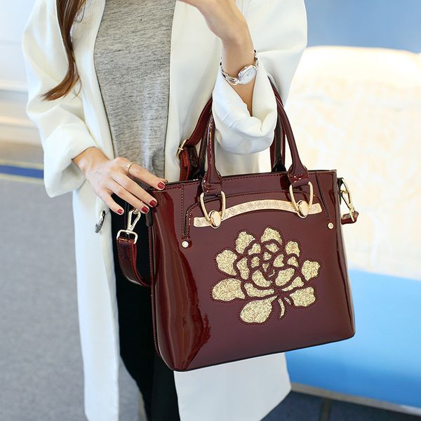 

middle - aged women's bag with a simple lacquer leather slanted satchel for the bride