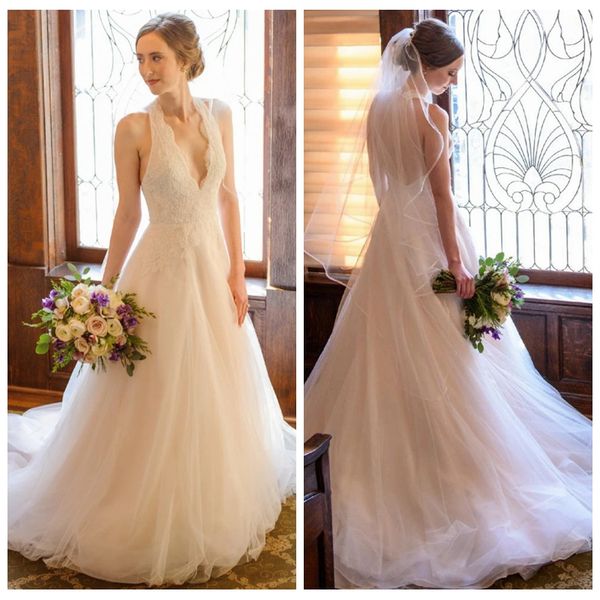 

2020 unique halter neck a line wedding dresses lace appliques beach wedding dresses with sweep train backless lace wedding dress, White