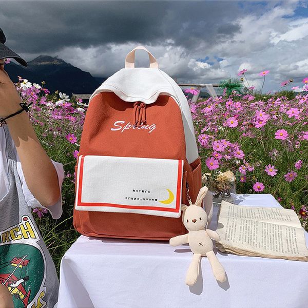 

brand large capacity canvas backpack 2019 new fashion sewing student bag wear pendant girl backpack sale