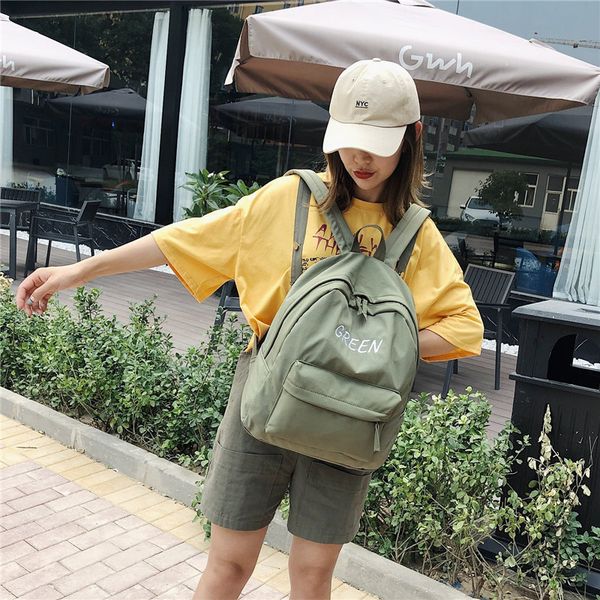 

2020 new backpack ladies men's casual solid color korean student backpack