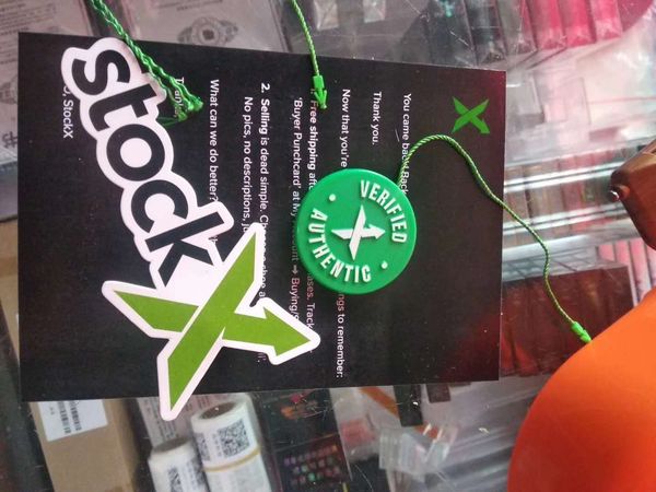 

stockx store shoes tags stock x green circular tag rcode stickers flyer plastic shoe buckle verified x authentic green tag, White;pink