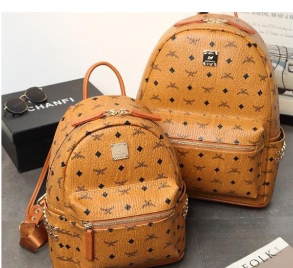 

нова модна ђмка коѬейкий м панк заклепки Ѭкзак мђжкой и женкий Ѭкзак ђд